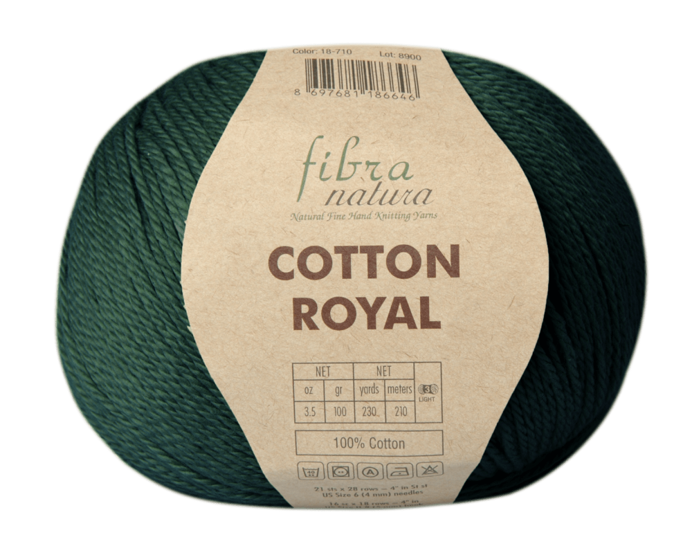 A ball of Fibra Natural Cotton Royal yarn in a deep forest green shade, wrapped with a large beige paper label showing product details.