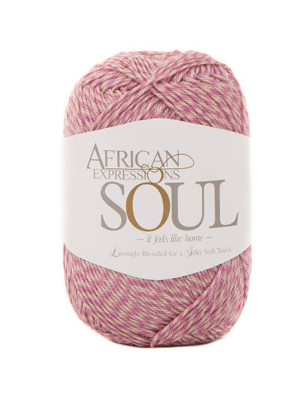 A single skein of African Expressions Soul yarn in a dusty pink and white variegated colorway, centered on a plain white background.